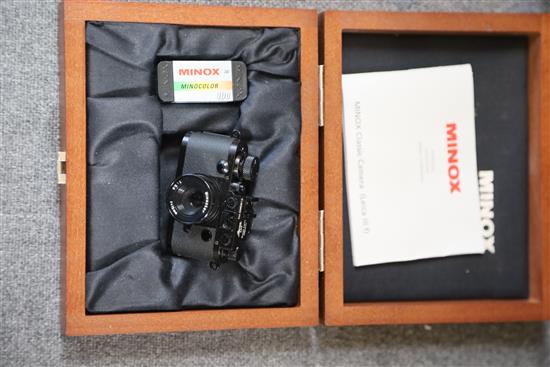 A cased Minox Leica miniature camera, a Minox glass, Contax 1 and a Minox Classic Leica III (3)